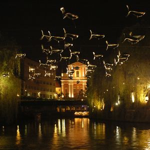 <i>Anchovies over Ljubljanica river</i> by French collective Aerosculpture, <!--LINK'" 0:624-->, 2008