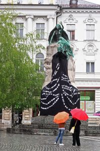 <i>Prešeren's Coat</i>, by <!--LINK'" 0:462-->, art installation using passages from the poet's longest poem <i>Krst pri Savici</i>[Baptism at Savica] on a new robe dressing Prešeren's monument,  <!--LINK'" 0:463-->, 2010