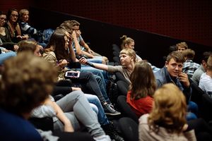 A post-screening discussion amongst highschoolers, taking place at <!--LINK'" 0:945-->, 2015